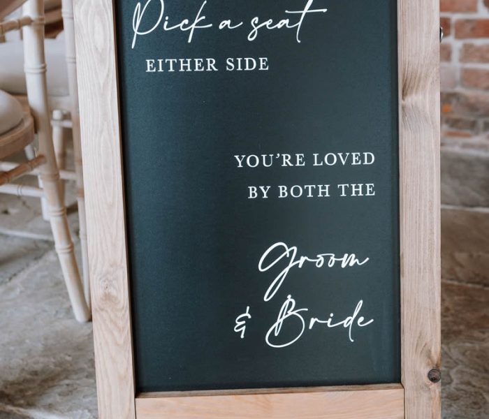 Pick a seat sign